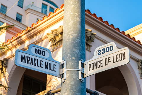 A stock photo of a street sign in Coral Gables, Florida.
