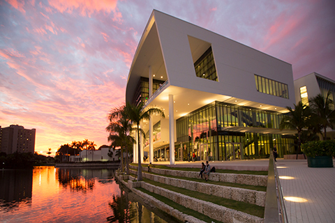 A photo of the Shalala Student Center at the University of Miami Coral Gables campus during sunset.